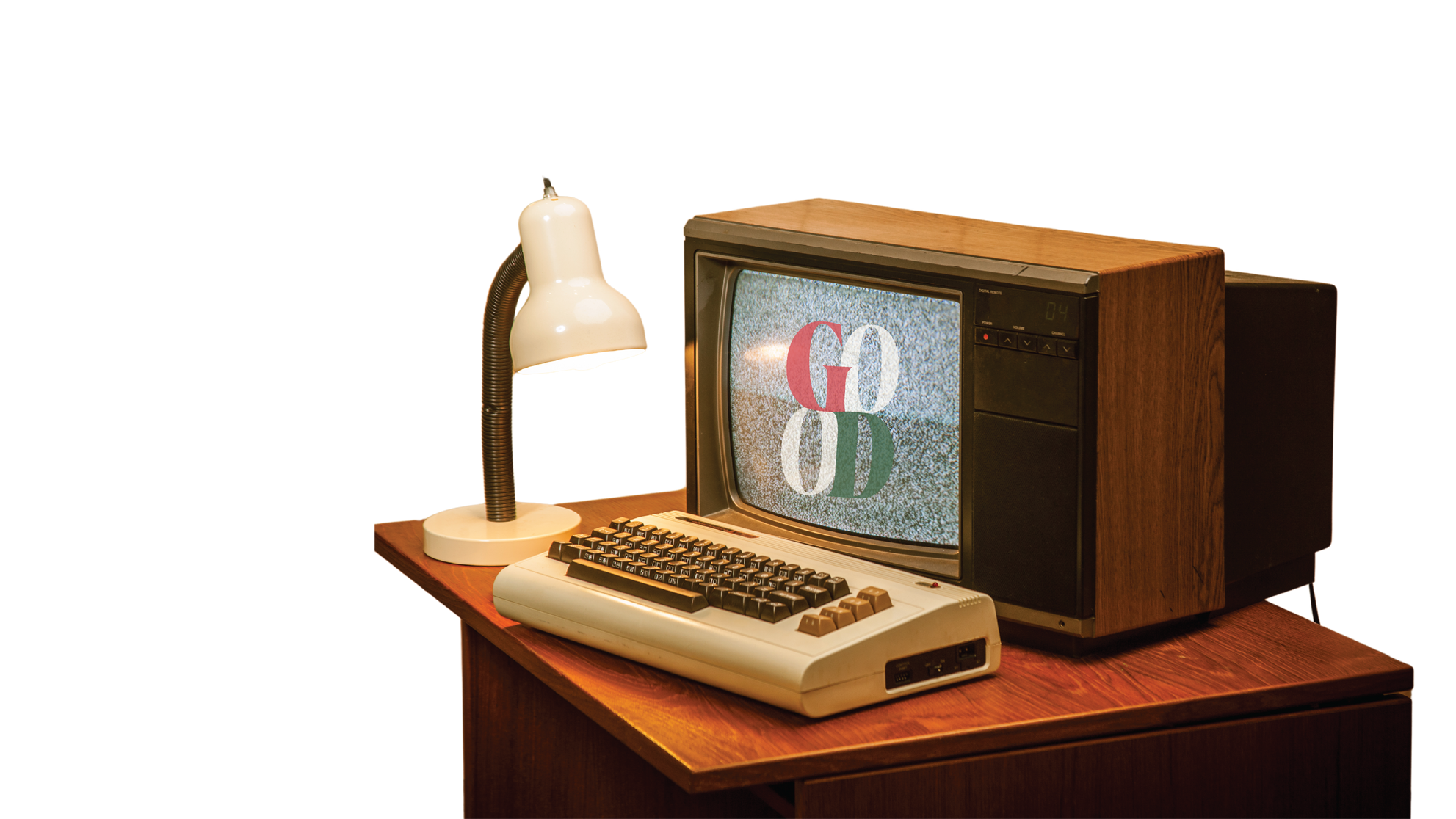 an old computer sitting on a desk next to a lamp with the Good Days Marketing icon inside the computer screen